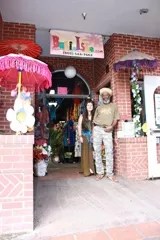 Wendy Oliver and Ras Danny outside the Bali Isle shop in San Luis Obispo